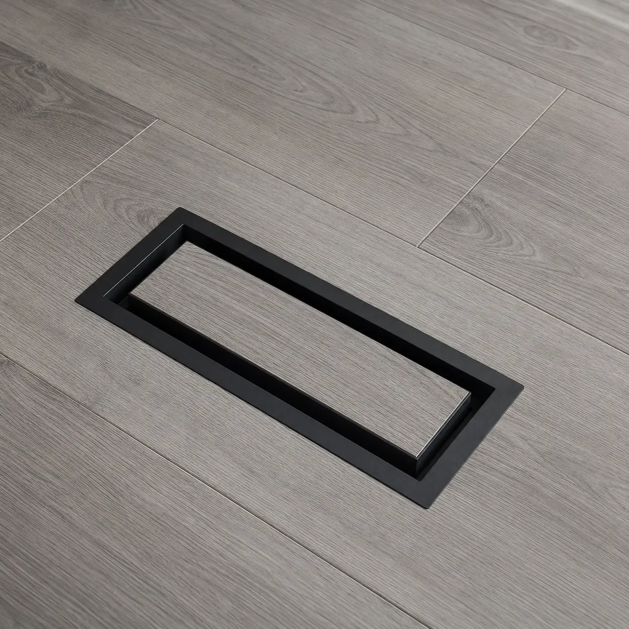 Flooring insert vent cover installed in a finished floor